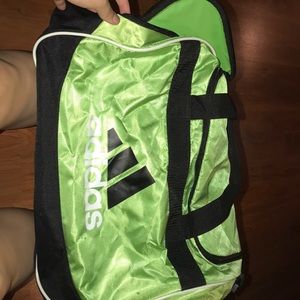 A green adidas athletic bag